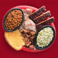 Pork 3 Ways® · Pulled Pork, Sliced Pork and Sweet & Smokey Ribs. Served with BBQ beans, coleslaw and garlic...
