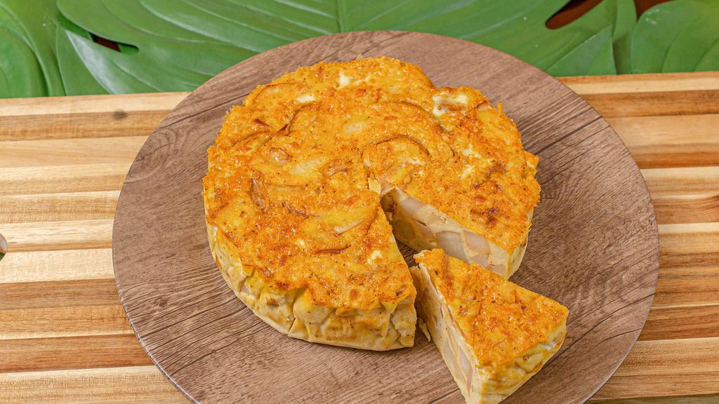Tortilla Espanola · Vegetarian and Gluten Free. Crustless egg pie filled with layers of potato and caramelized onions.