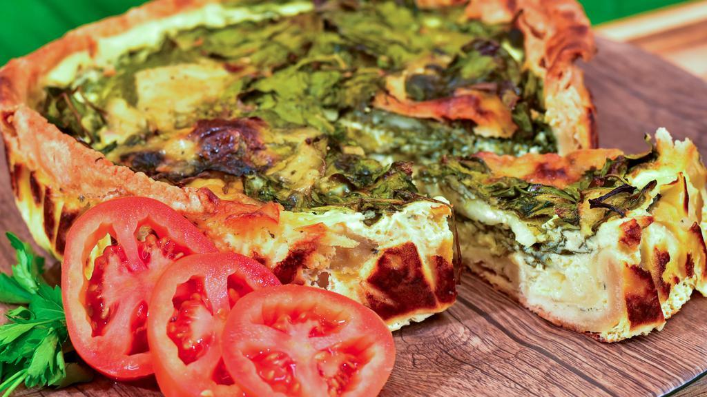 Quiche · Vegetarian. A flaky shell filled with egg, cheese and ham, or egg cheese and vegetables.