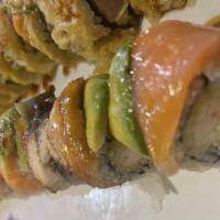Super Crunch Roll · Shrimp tempura inside, smoked salmon eel on top with eel sauce and tempura flake.