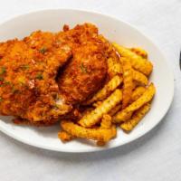 Fried Pork Chops · Two fried pork chops, served with seasoned fries or mashed potatoes with gravy