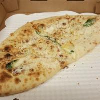 Stuffed Pizza Veggie Lovers - Half Pie · Mushrooms, onions, peppers, olives, fresh tomatoes, zucchini, artichoke hearts, mozzarella a...