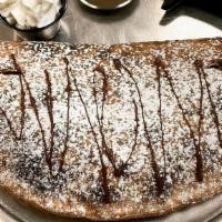 Nutellino · Light pizza dough filled with Nutella and baked to perfection. Topped with powdered sugar, c...