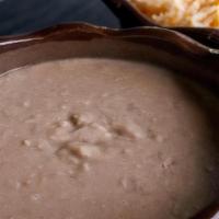 Refried Beans · Refried pinto beans.