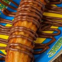 Bigmania · Churros filled and glazed with your filling of preference.