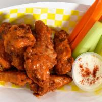 Wings · Choice sauce - sweet chili BBQ or buffalo, Cajun ranch, carrot and celery.