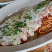 Chicken Parmigiano · Coated with breadcrumbs, deep-fried, topped with marinara sauce and mozzarella cheese, serve...