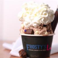 Nitro Frosty · Ice Nutella, brownies, white chocolate, whip cream, and a dulce de leche syringe.