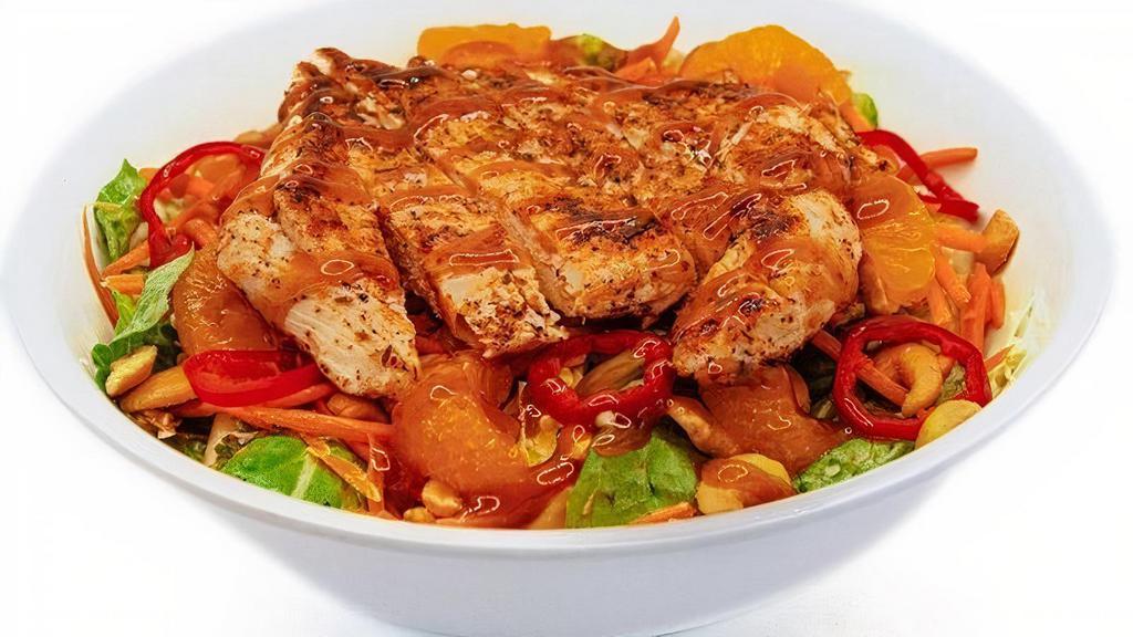Asian Sesame Salad · Your Choice of Grilled or Breaded Chicken, Fresh Greens, Cashews, Mandarin Oranges, Carrots, Fresno Peppers, and Asian Sesame Dressing
