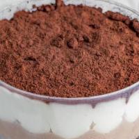 Tiramisu · Sponge cake soaked in espresso, topped with mascarpone cream.