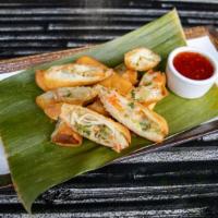 Spring Roll · Fried spring rolls filled with assorted vegetables, sweet and sour sauce.