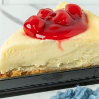 Cherry Cheesecake · slice New York style cheesecake with cherry topping.