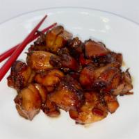 Bourbon Chicken · Grilled chicken topped with our house special sauce. Fusion of East meets West!