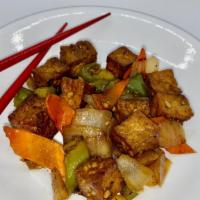 Sautéed Tofu · Cubed tofu sautéed in soy sauce with garlic, bell pepper and carrots.