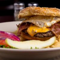 Hangover Burger · Bacon, American cheese and a fried egg. Served with fries.