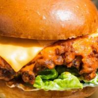 Classic Fried Chicken Griller Combo · Crispy and lightly fried buttermilk-batter chicken breast, melted aged Swiss cheese, hand-sh...