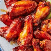 Classic Hot Wings · Six piece chicken wings tossed in hot sauce. served with fries