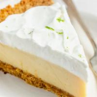 Key Lime Pie · Key limes, sweetened condensed milk, and rolled pie crust served with whip cream.
