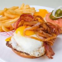 Muncheez (The Hangover) Cheeseburger Deluxe · Most popular. ( 1/2 pound USDA beef patty), Sunny side up egg, bacon, jalapenos, and fries. ...