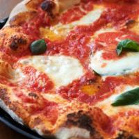 Margherita Pizza · Tomato sauce, fior di latte fresh mozzarella and basil. It tastes even better than it looks ...