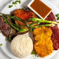 Guatemalan Platter · Grilled steak, sausage and baked chicken served with rice and one side