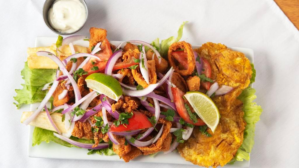 Jalea Mixta · A mixture of fish, squid, shrimp, and mussels, fried in a lightly-seasoned batter served with fried yuca and salsa criolla.