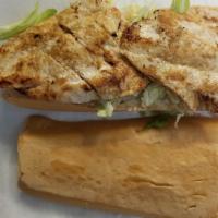 Chicken Sandwich · Chicken breast tomatoes and pepitas dura (potato sticks).