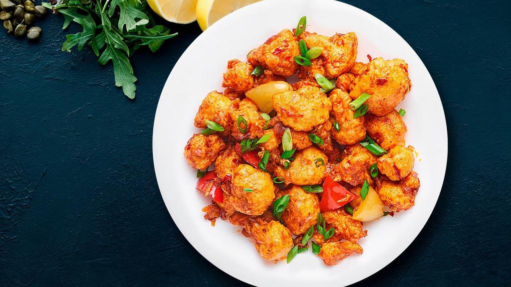 Fb'S Gobi Manchurian · A classic Indo-Chinese specialty of lightly battered, marinated cauliflower sautéed with garlic, chilli, and soy sauce. Not gluten free.