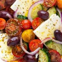 Greek Salad · Traditional, feta, and olives.