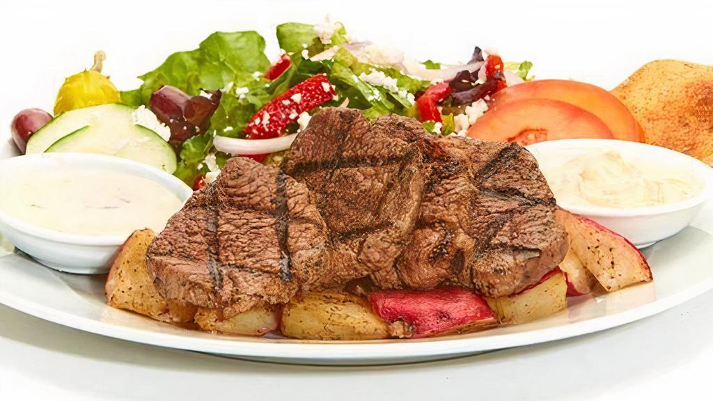 Grilled Beef Tender Feast · Served with a side of horseradish sauce, Greek salad, and your choice of roasted new potatoes or basmati rice.