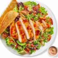 Grilled Chicken · crisp iceberg lettuce topped with cucumbers, red onions, carrots, cherry tomatoes, banana pe...