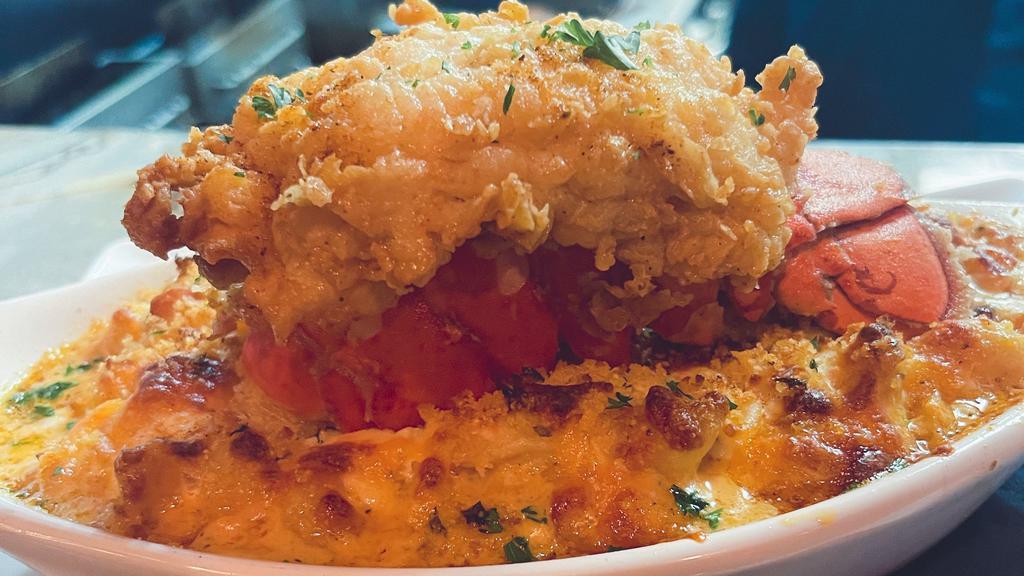 Lobster Tail & Mac N Cheez · lightly breaded & fried, over seafood mac n cheeez