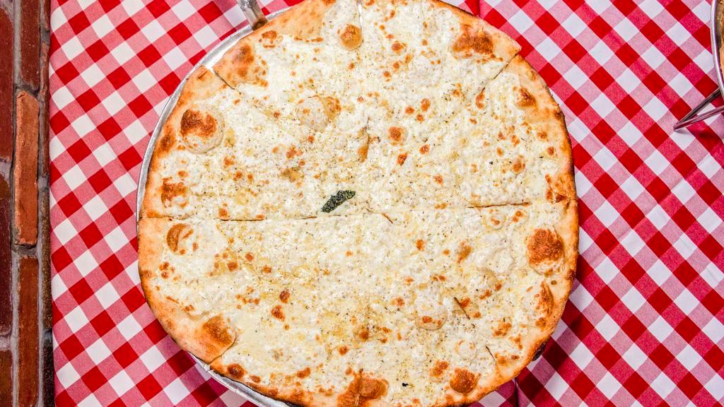 Quattro Formaggi · Our classic White PIzza with Mozzarella, Asiago, Parmesan, Pecorino Romano and Gorgonzola cheese