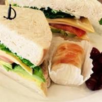 Veggie Sandwich · Lettuce, tomato, american, swiss, avocado, tomato, mustard, and mayo on your choice of bread