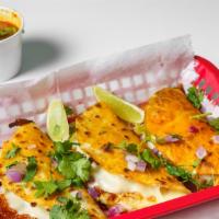Birria Chicken Taco · 3 Chicken tacos with cheese, diced, onions, cilantro and a small cup of consume!