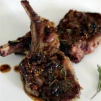 Honey Glazed Lamb Chops · Grilled lollipop lamb chops drizzled with our signature glaze