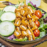 Large Buffalo Fried House Salad · Our buffalo Fried House salad is made fresh, with an organic spring lettuce blend, topped wi...