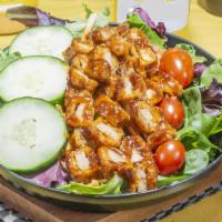 Large Bbq Fried House  Salad · Our BBQ fried house salad is made fresh, with an organic spring lettuce blend, topped with c...