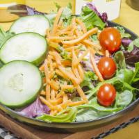 Large House  Salad · Our House salad is made fresh, with an organic spring lettuce blend, topped with cucumbers, ...