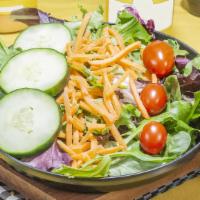 Small House  Salad · Our House salad is made fresh, with an organic spring lettuce blend, topped with cucumbers, ...