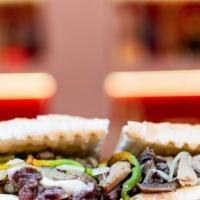 Italian Cheese Steak · Steak - Oninos - Peppers - Mushrooms - Provolone Cheese