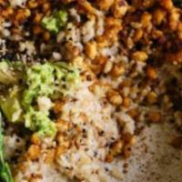 Coconut Rice Bowl · Smoked coconut rice, wild lump crab salad, cilantro chimichurri. (GF)
