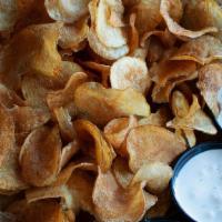Housemade Chips & Dip · Thinly sliced housemade chips served with a variety of dips