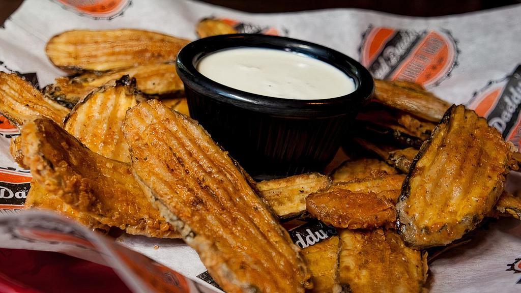 Fried Pickles · Hand-Breaded pickles served with traditional ranch dressing
