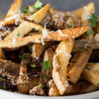 Truffle Parmesan Fries · Hand-Cut fries tossed with truffle salt, Parmesan cheese, green onions, herbs & parsley with...
