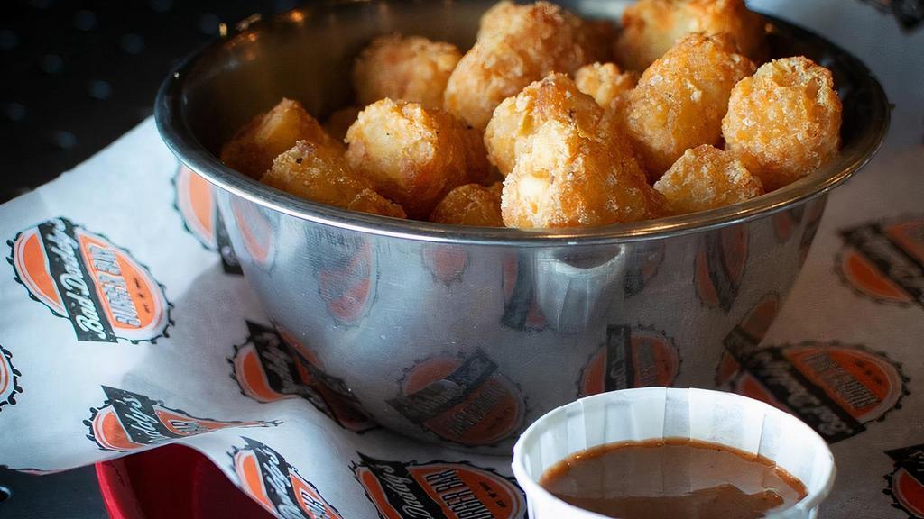 Tater Tots · Crispy tots served with our famous Bad Daddy's sauce on the side