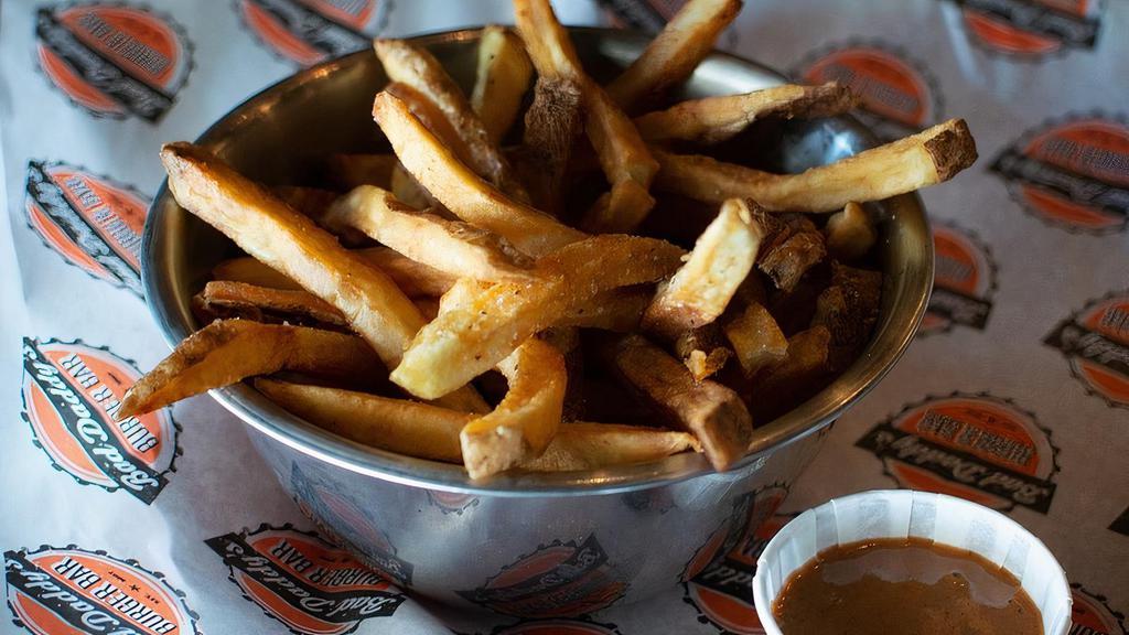 Hand-Cut French Fries · Classic hand-cut fries served with a side of our famous Bad Daddy's sauce