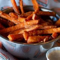 Sweet Potato Fries · Sweet potatoes cut and fried to perfection, served with a side of chipotle ranch