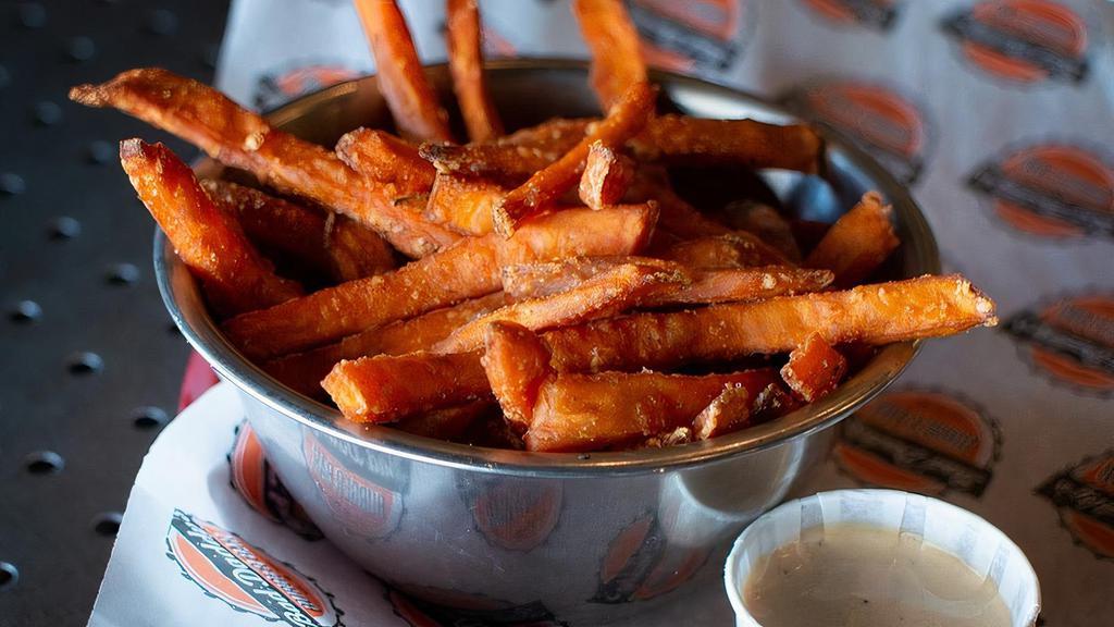 Sweet Potato Fries · Sweet potatoes cut and fried to perfection, served with a side of chipotle ranch