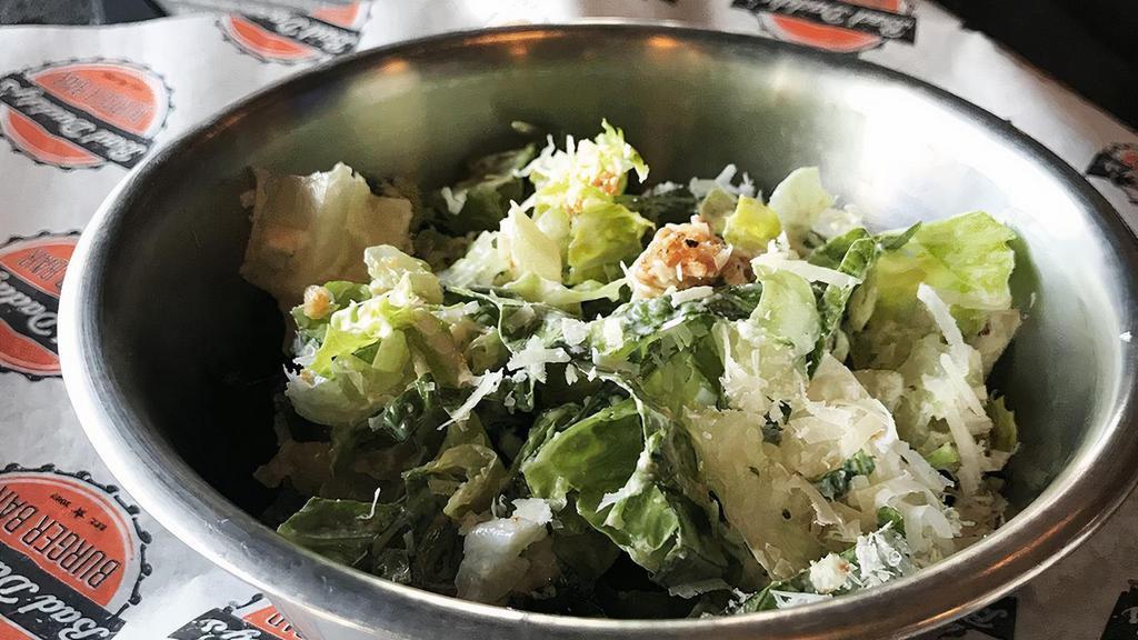 Charlotte'S Side Caesar Salad · Romaine Lettuce, Caesar dressing, croutons & Parmesan cheese